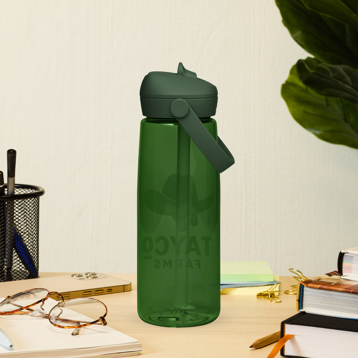 Back of a Tayco Farms forest green water bottle