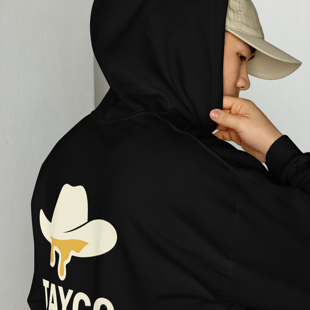 Back view of a black Tayco Farms signature hoodie