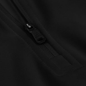 Clothing detail of a black Tayco Farms Adidas quarter-zip pullover