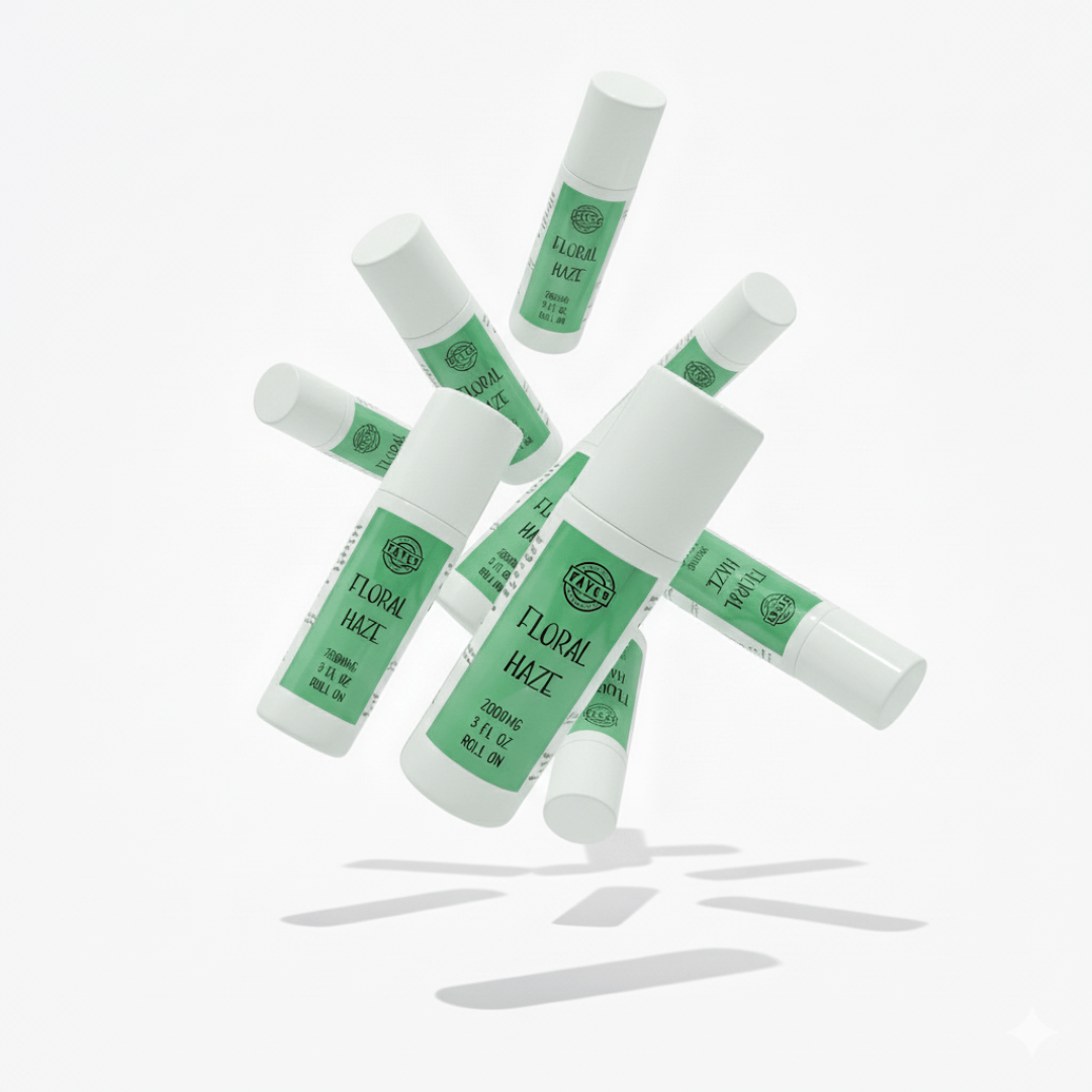 Tayco Farms Floral Haze roll-on bottles in a floating arrangement