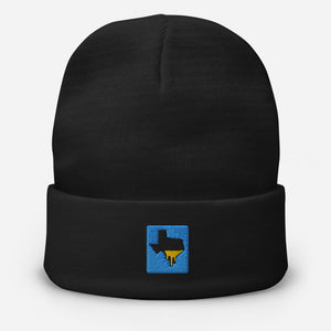 Front of a black Tayco Farms embroidered Texas logo beanie