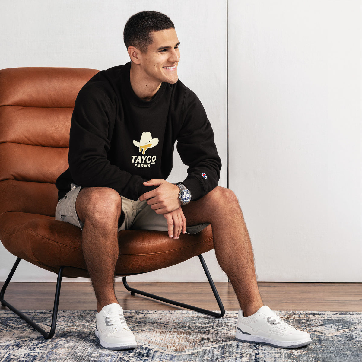 Front view of a black Tayco Farms western Champion sweatshirt
