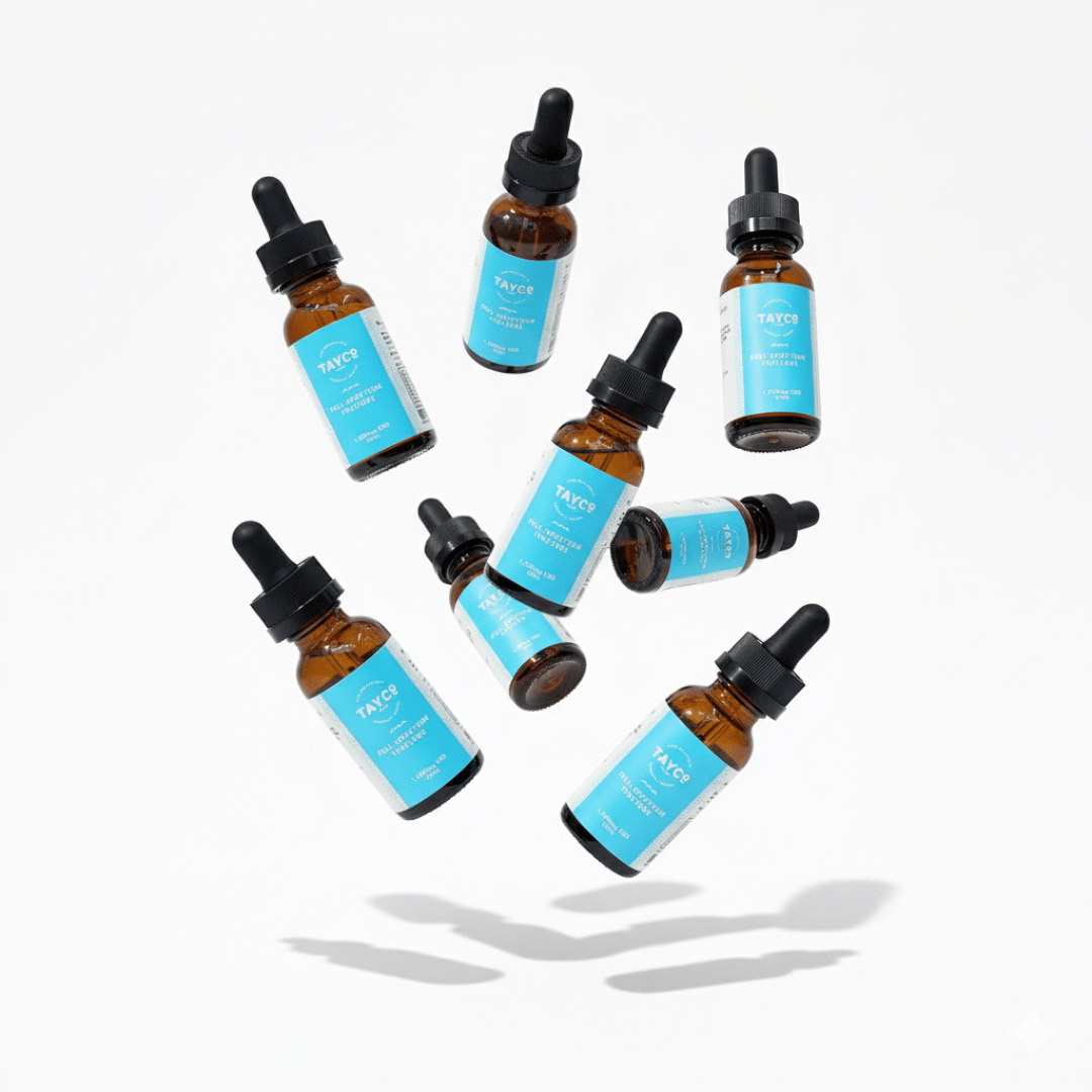 Tayco Farms full spectrum CBD tincture bottles in a floating arrangement