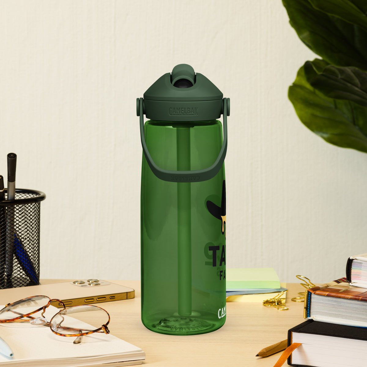 Right side of a Tayco Farms forest green water bottle